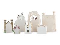 Seven Staffordshire Glazed Earthenware Buildings and Figural Groups