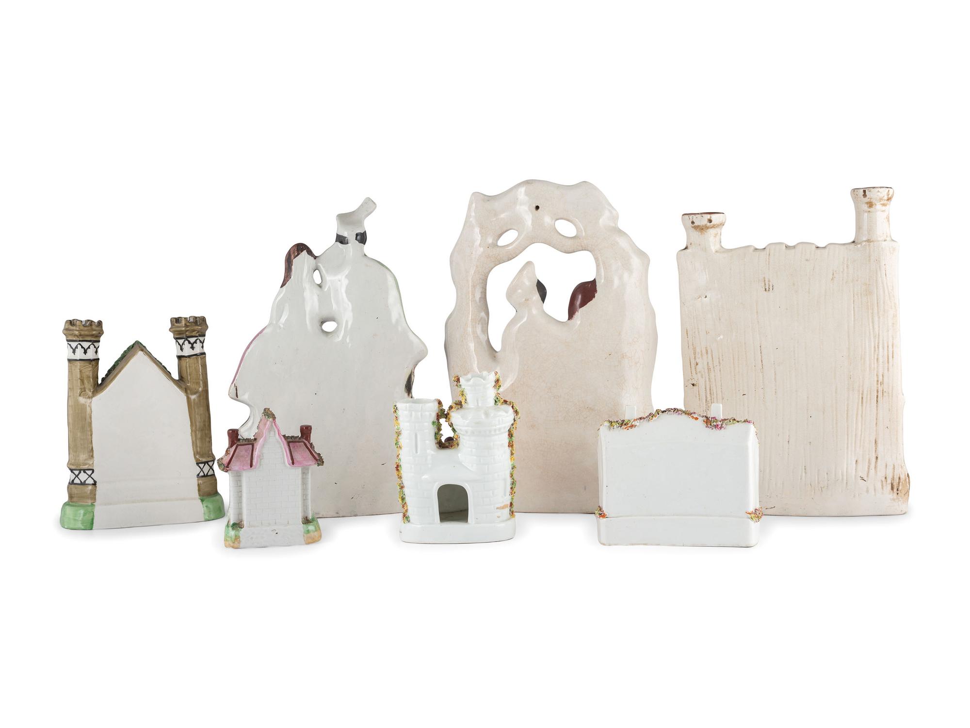 Seven Staffordshire Glazed Earthenware Buildings and Figural Groups