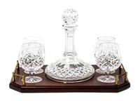 A Waterford Cut Glass Brandy Decanter and Four Snifters Height of decanter 10 inches. — 20TH CENTURY