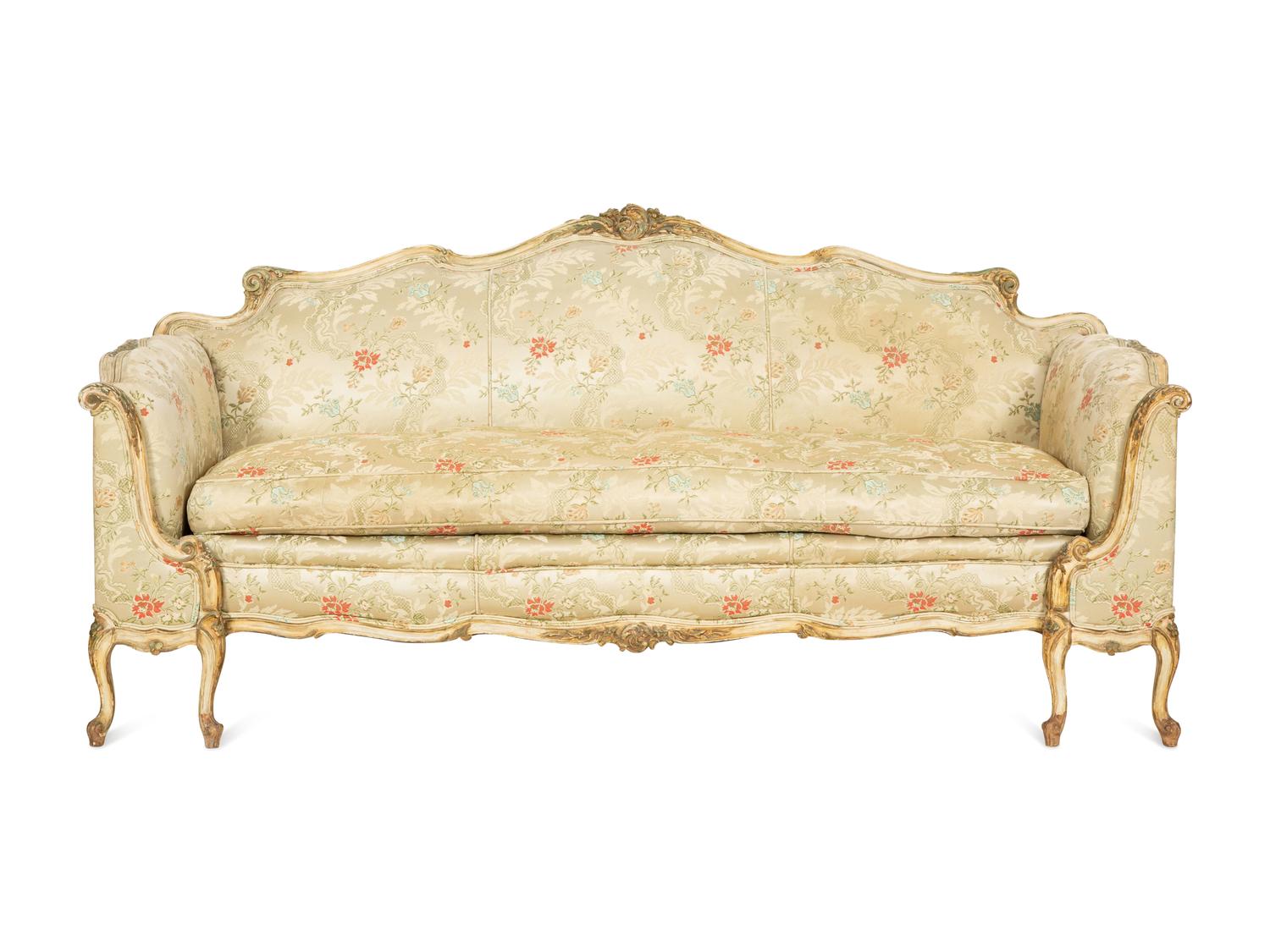 A Louis XV Style Painted and Parcel Gilt Sofa
