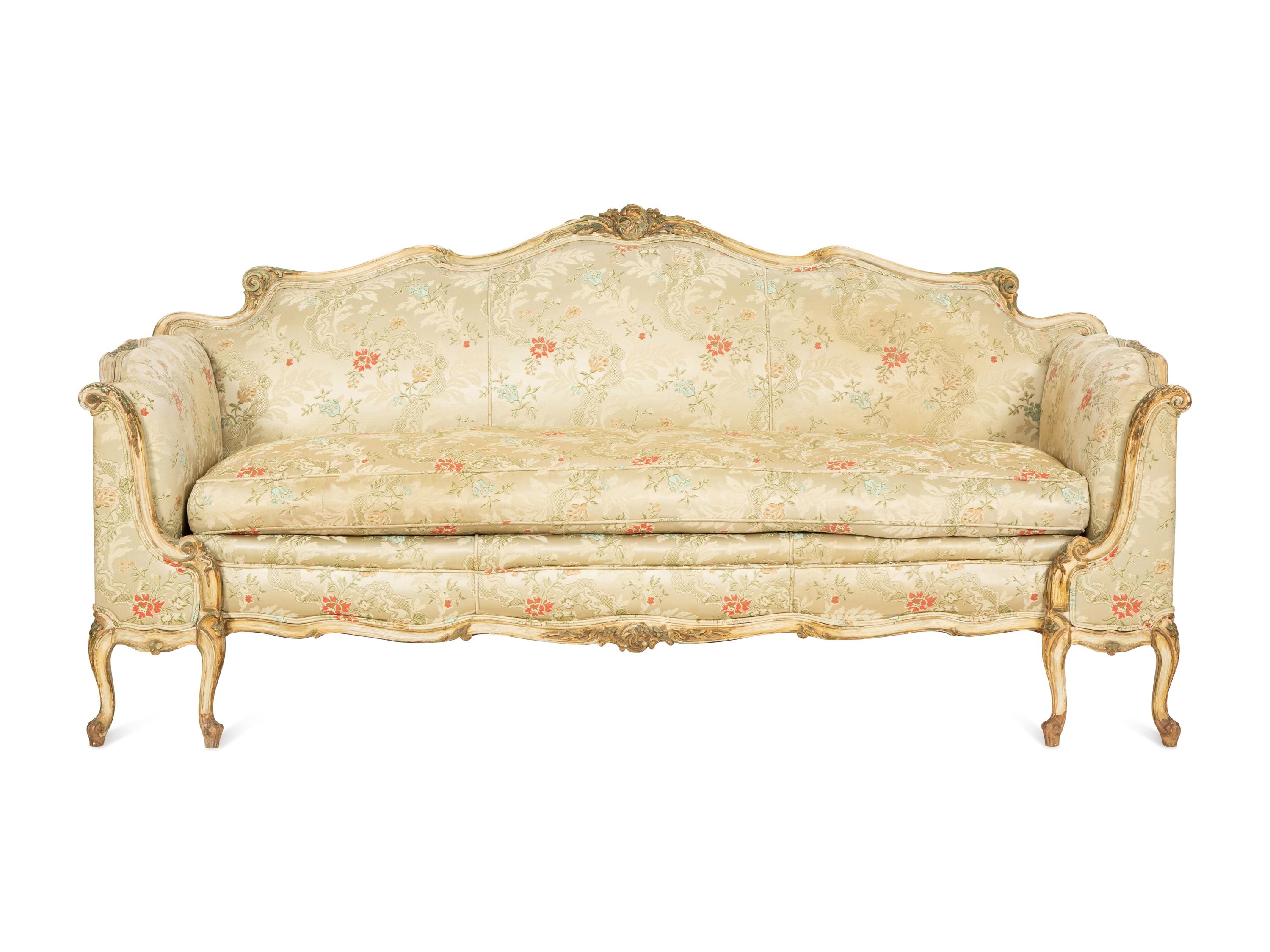 A Louis XV Style Painted and Parcel Gilt Sofa
