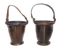 A Pair of A Brass Banded Leather Fire Buckets Height of taller 10 3/4 inches.