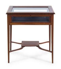 An Edwardian Mahogany and Fruitwood Vitrine Table