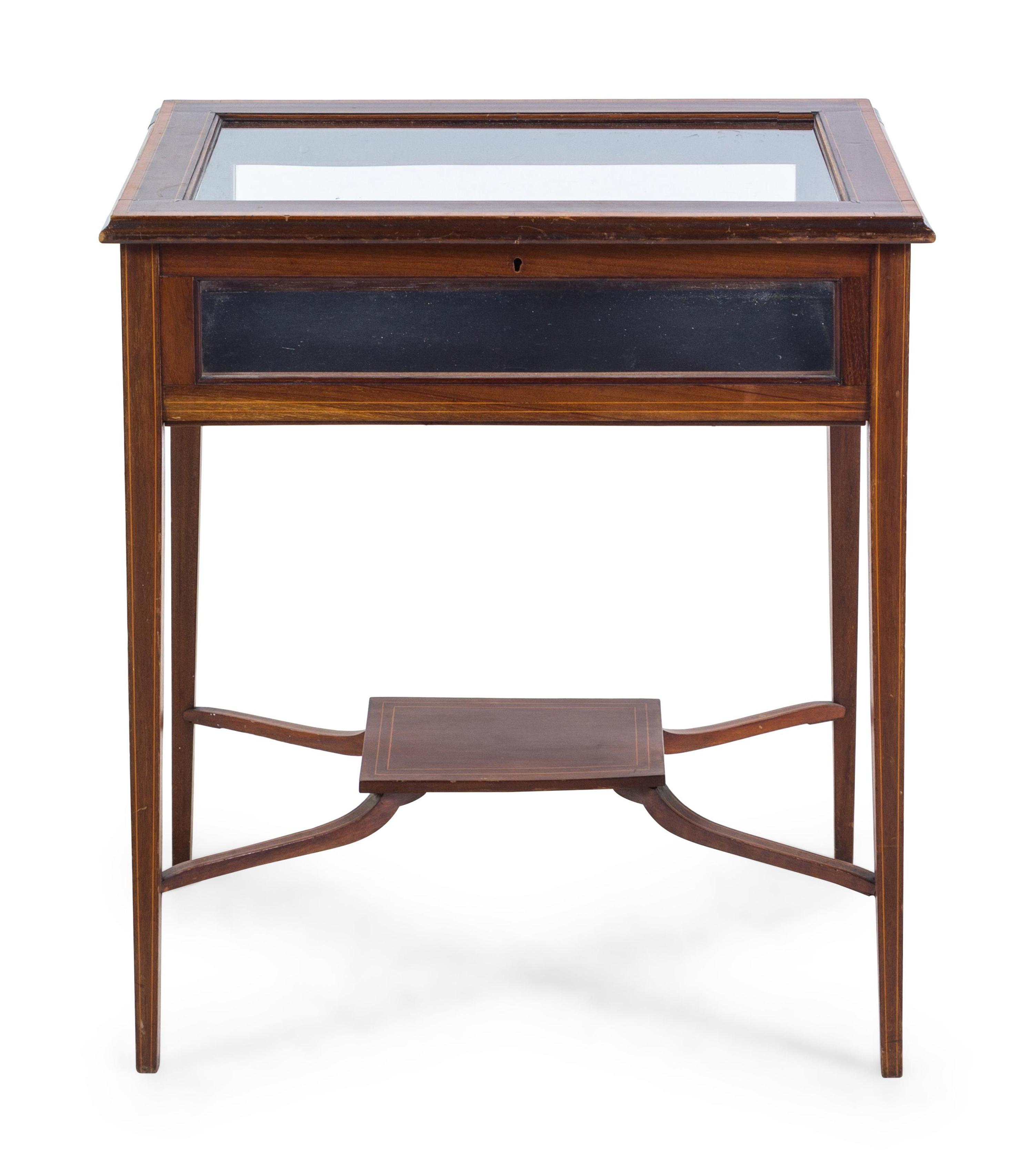 An Edwardian Mahogany and Fruitwood Vitrine Table