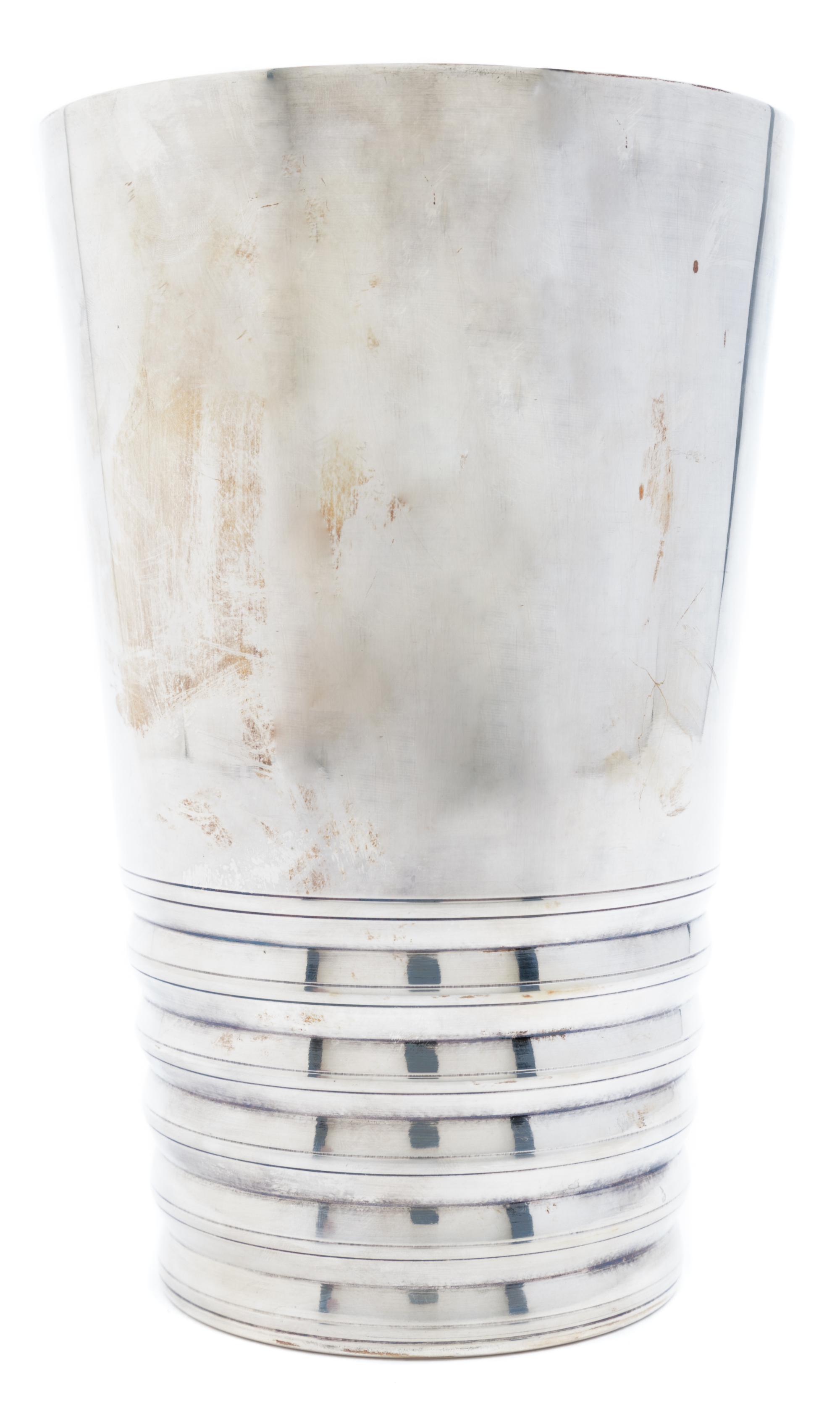 A Silvered Metal Vase Height 10 inches.