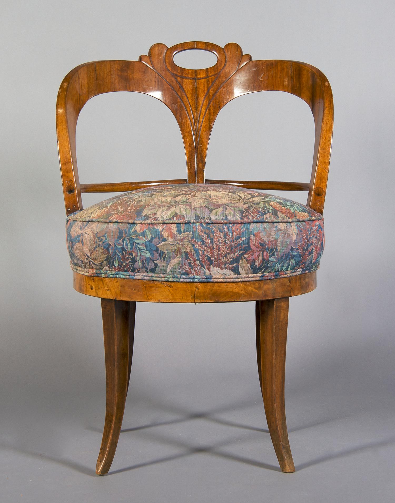 A Biedermeier Walnut Vanity Chair, Height 31 1/4 inches.