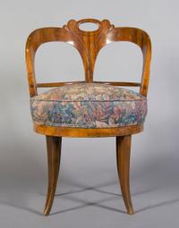 A Biedermeier Walnut Vanity Chair, Height 31 1/4 inches.