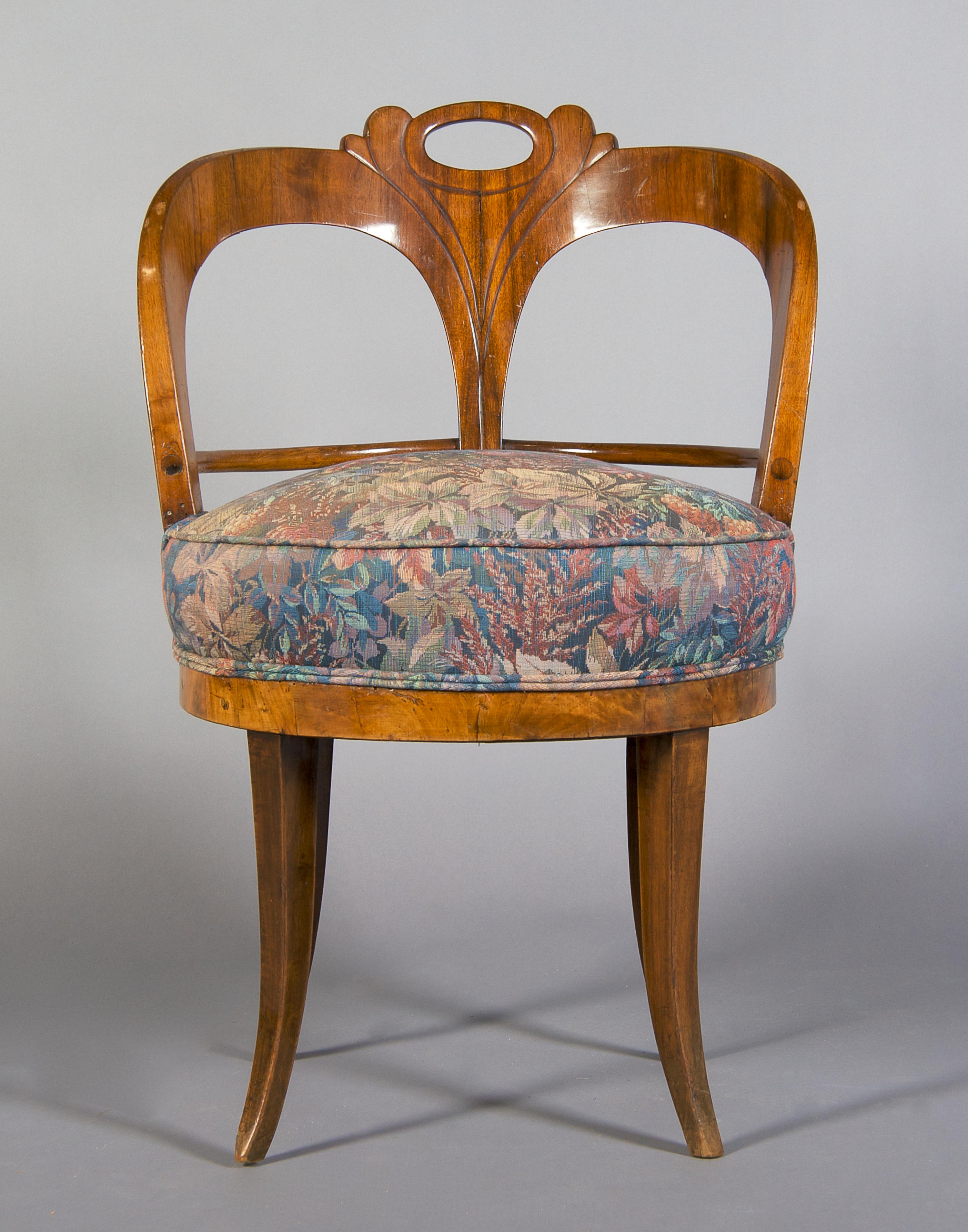 A Biedermeier Walnut Vanity Chair, Height 31 1/4 inches.