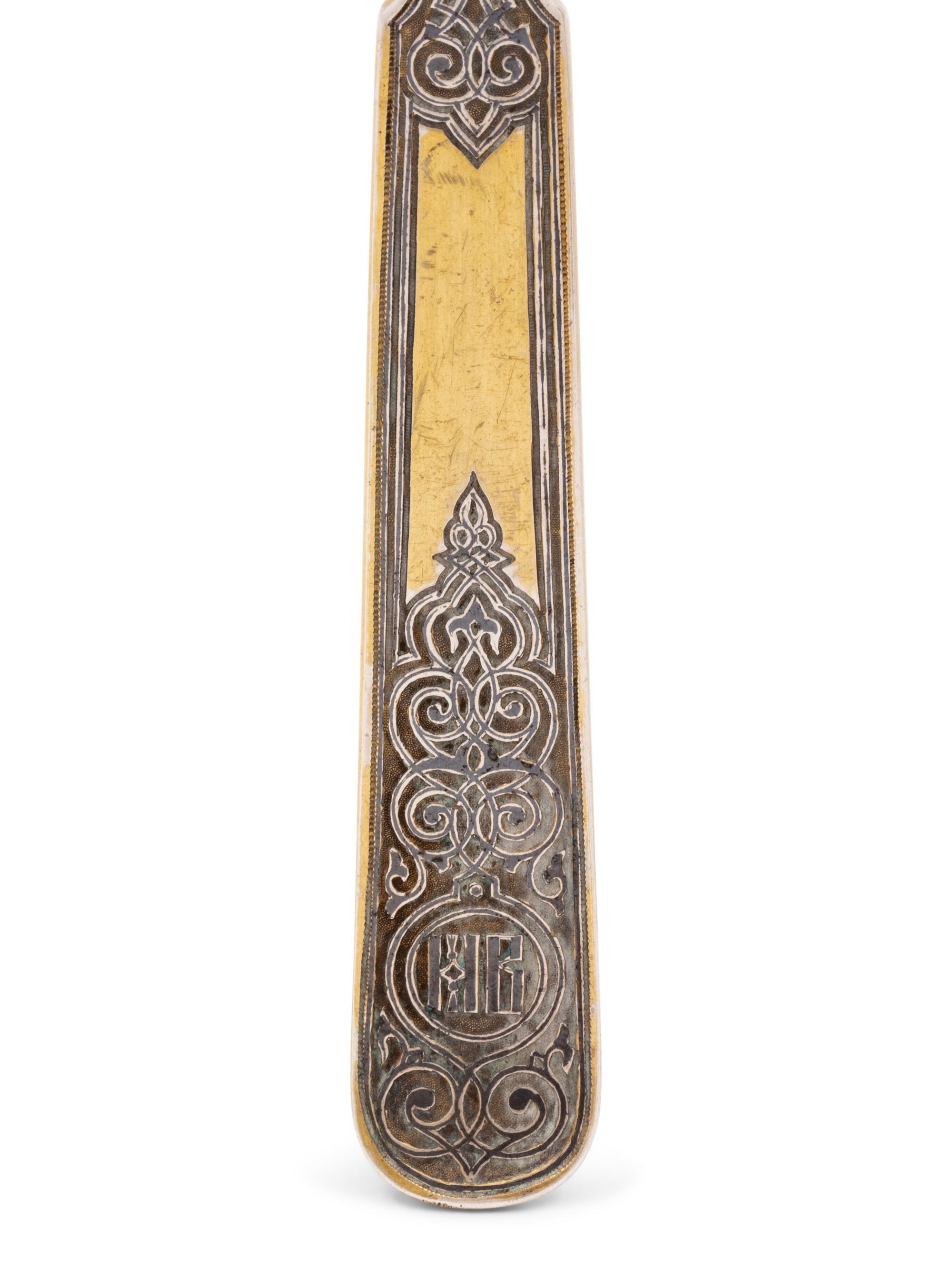 A Pair of Russian Niello Silver-Gilt Serving Spoons