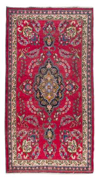 A Tabriz Wool Rug 6 feet 9 1/2 inches x 4 feet 1 1/4 inches.