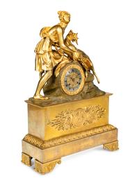 A Louis Philippe Gilt Bronze Figural Mantel Clock