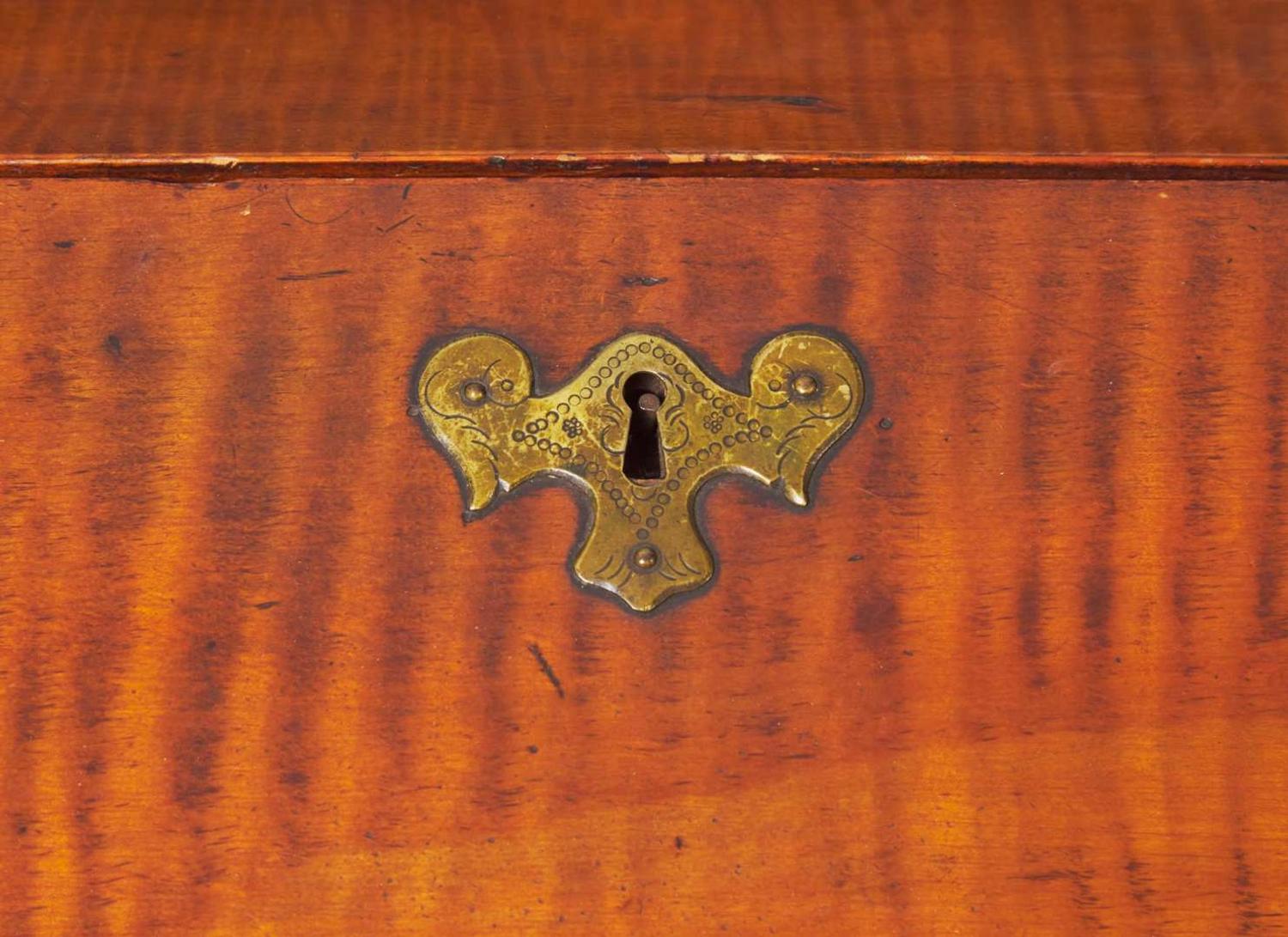 A William & Mary tiger maple and burl walnut veneered slant-front desk, New England, circa 1730