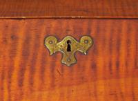 A William & Mary tiger maple and burl walnut veneered slant-front desk, New England, circa 1730