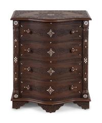 A Syrian Carved Mother-of-Pearl Inlaid Walnut Serpentine Chest of Drawers