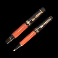 A Montblanc Limited Edition Ernest Hemingway Fountain Pen and Rollerball Pen Set