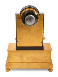 A Louis Philippe Gilt and Patinated Bronze Mantel Clock