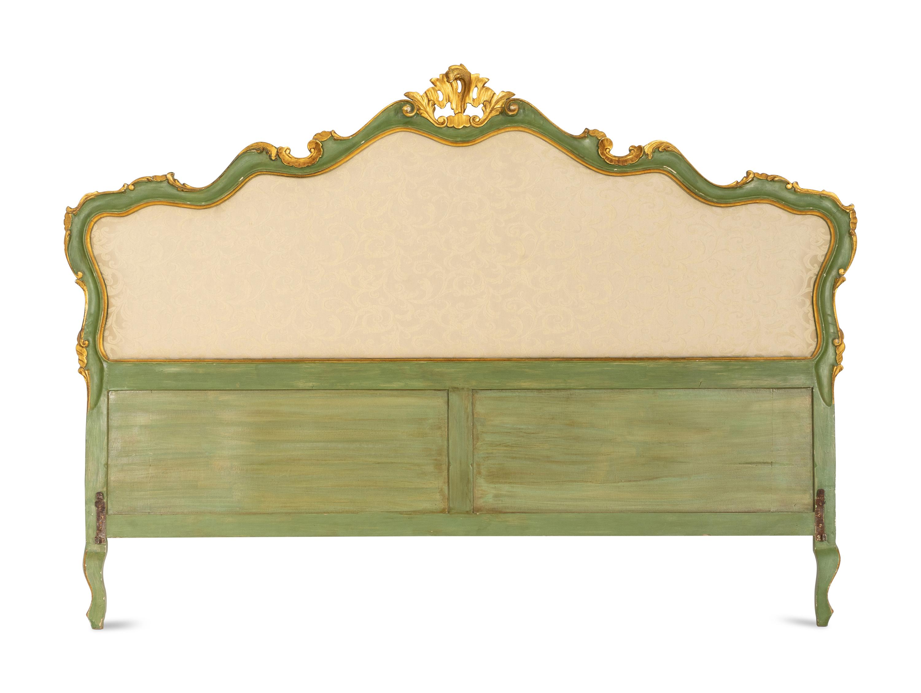 An Italian Green Painted and Parcel Gilt Headboard