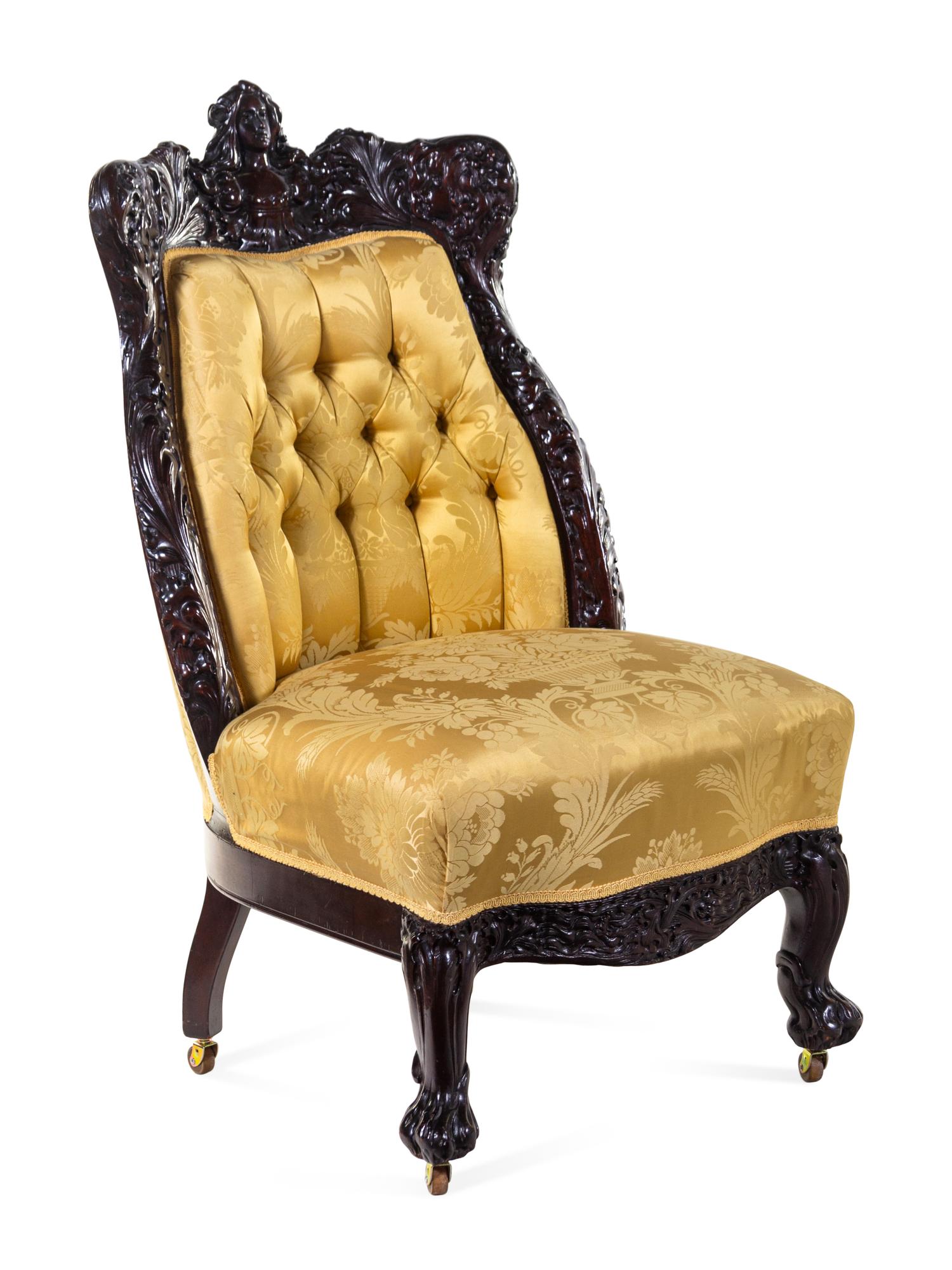 A Karpen Carved Mahogany Three-Piece Parlor Suite
