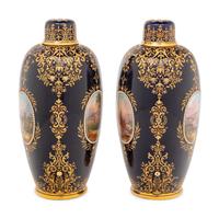 A Pair of Coalport Porcelain Covered Vases