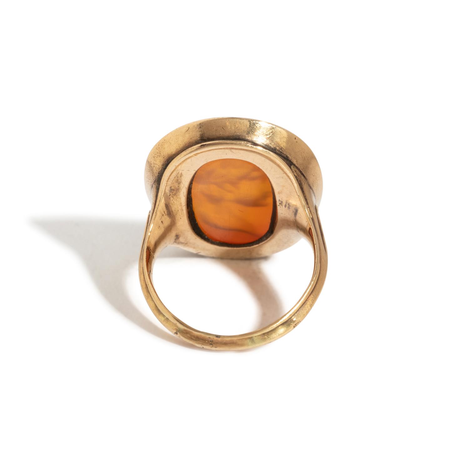 A Neoclassical Gold and Carnelian Finger Ring with a Male Portrait Head