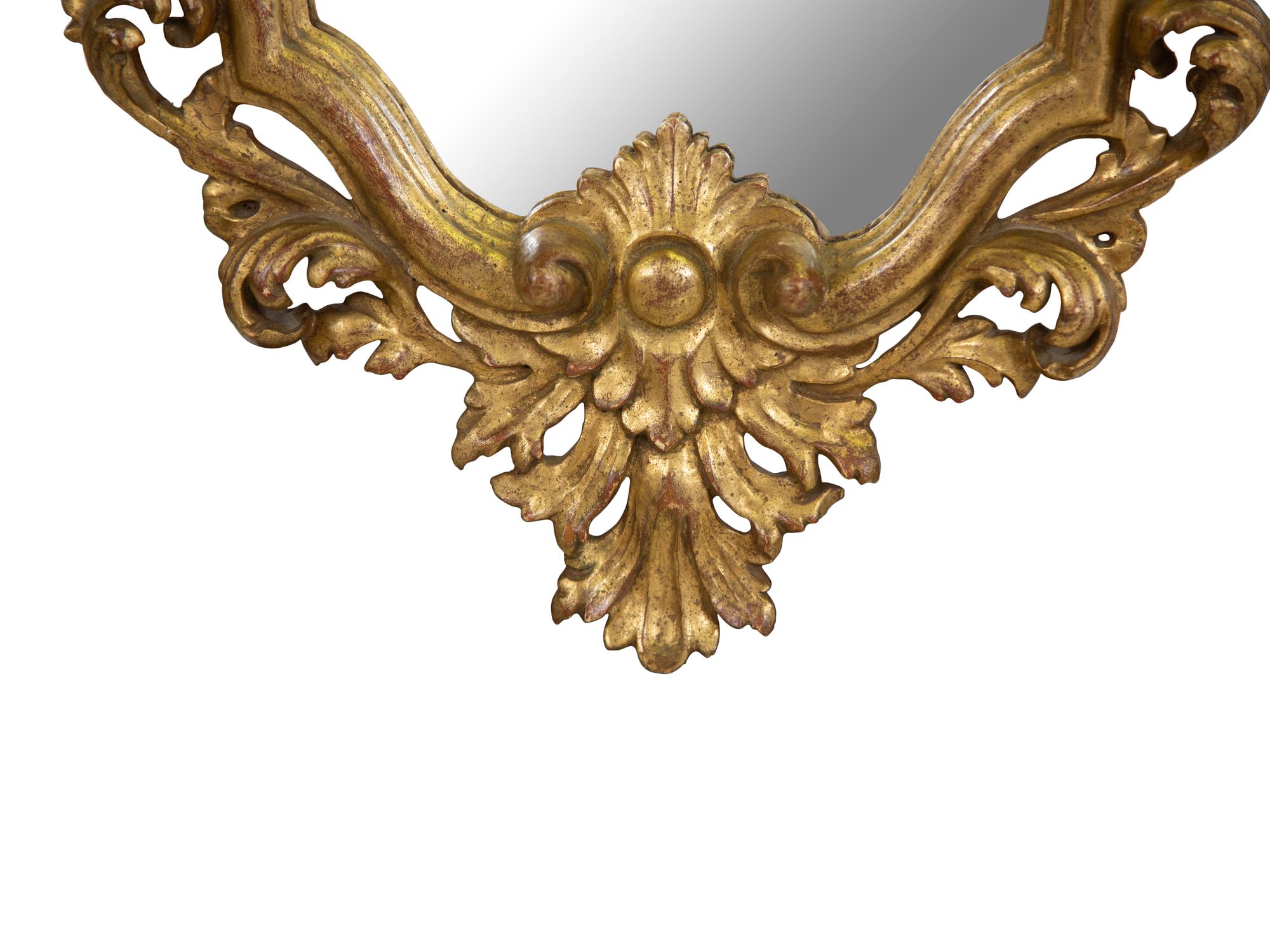 An Italian Rococo Style Giltwood Mirror