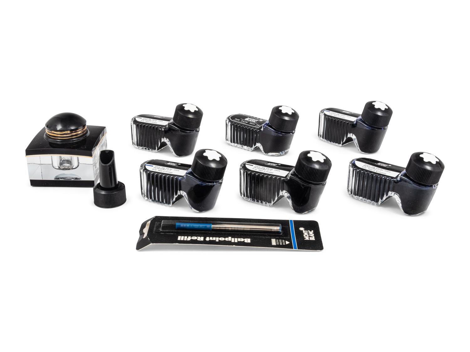 A Collection of Montblanc Inkwells and Refill Cartridges