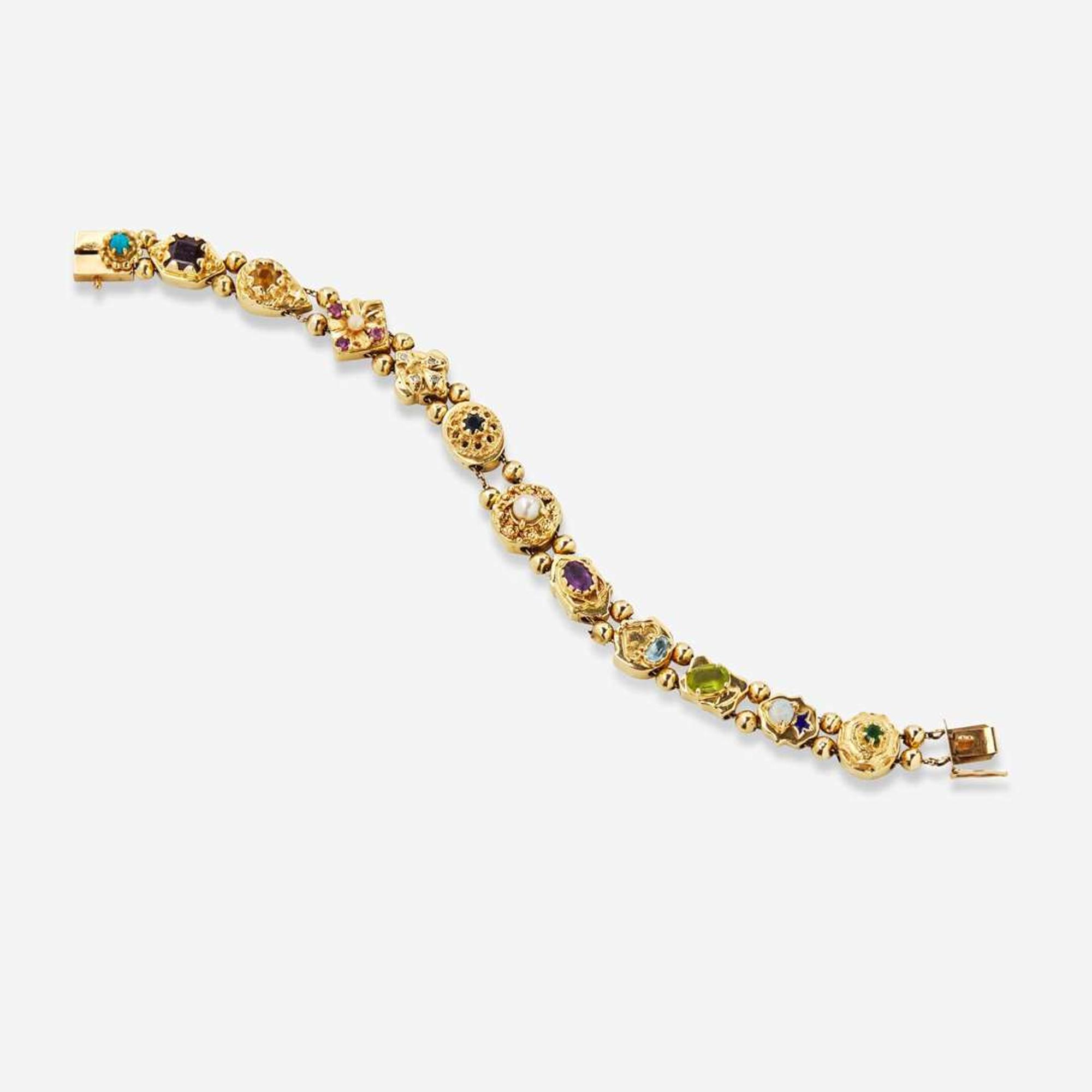 A 14K Yellow Gold Slide Charm Bracelet
