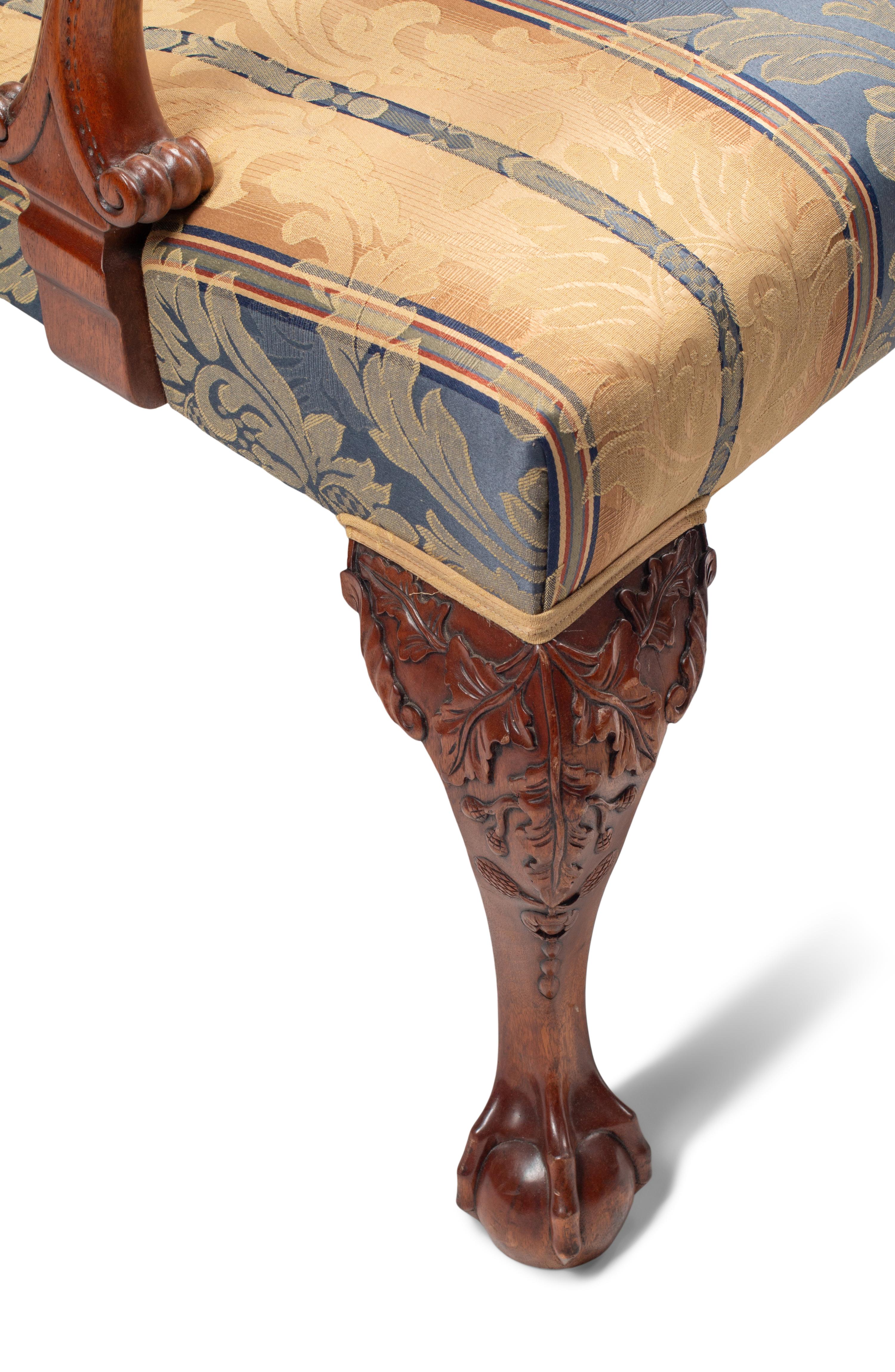 A Set of Eight George III Style Carved Mahogany Dining Chairs