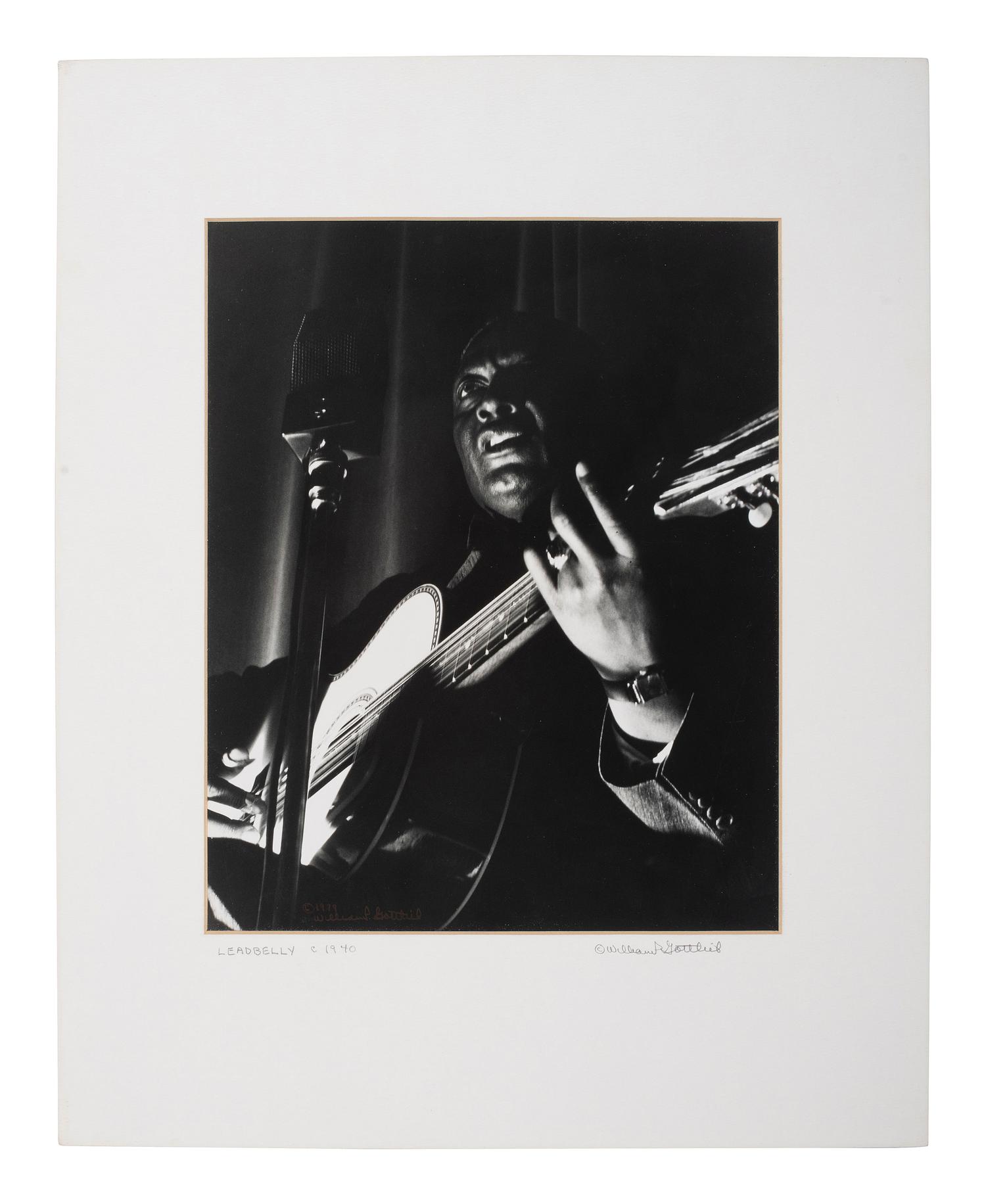 [EARLY PHOTOGRAPHY] -- [MUSIC]. GOTTLIEB, William P. (1917-2006), photographer. Lead Belly (Huddi Ledbetter), ca 1940 (printed later).
