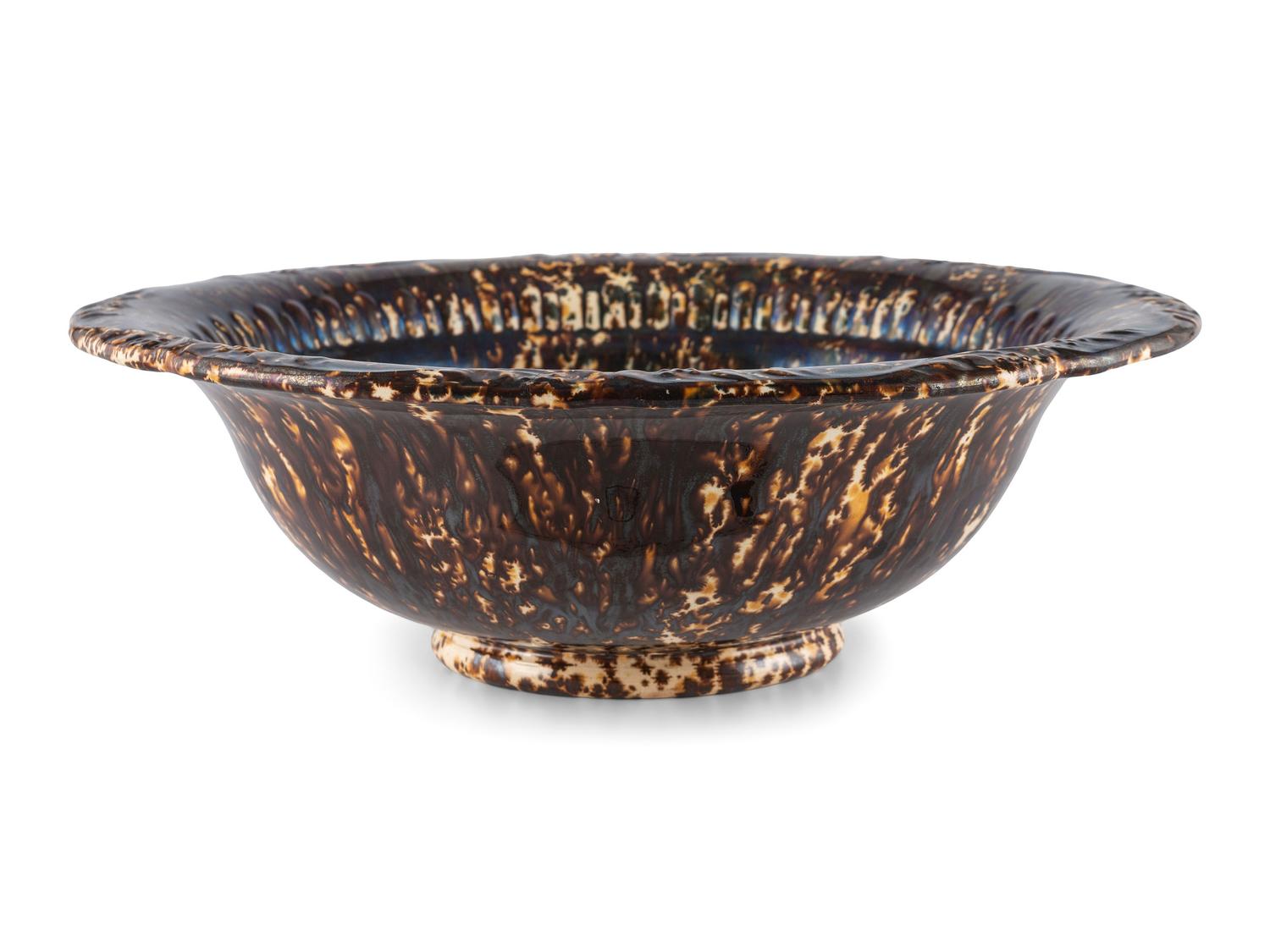 A Group of Rockingham Glaze Bowls and Molds