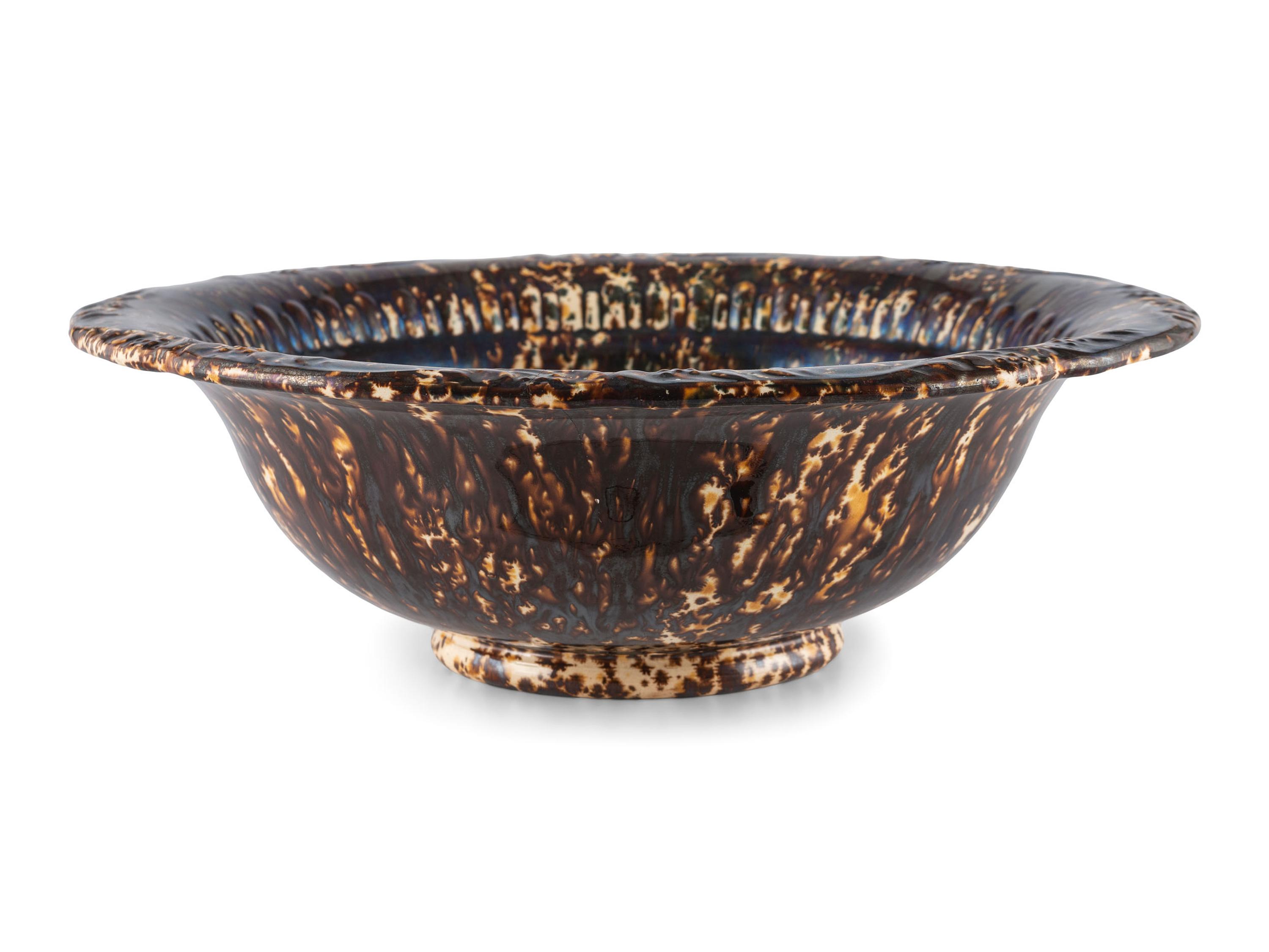 A Group of Rockingham Glaze Bowls and Molds