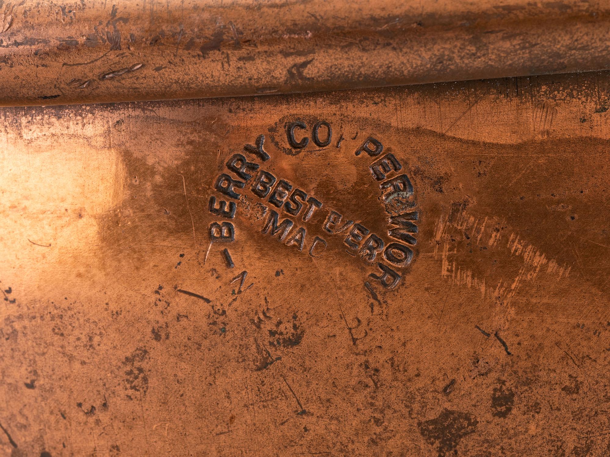 A Copper and Wrought Iron Bowl and Two Spun Brass Buckets