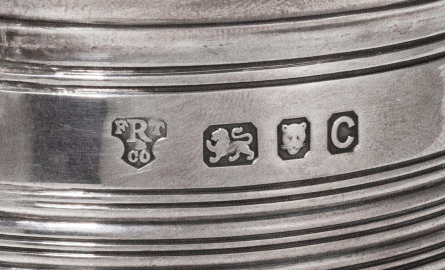 A George VI Silver Tankard, FRT & Co., London, 1938, of tapering form with ringed decoration.