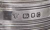 A George VI Silver Tankard, FRT & Co., London, 1938, of tapering form with ringed decoration.