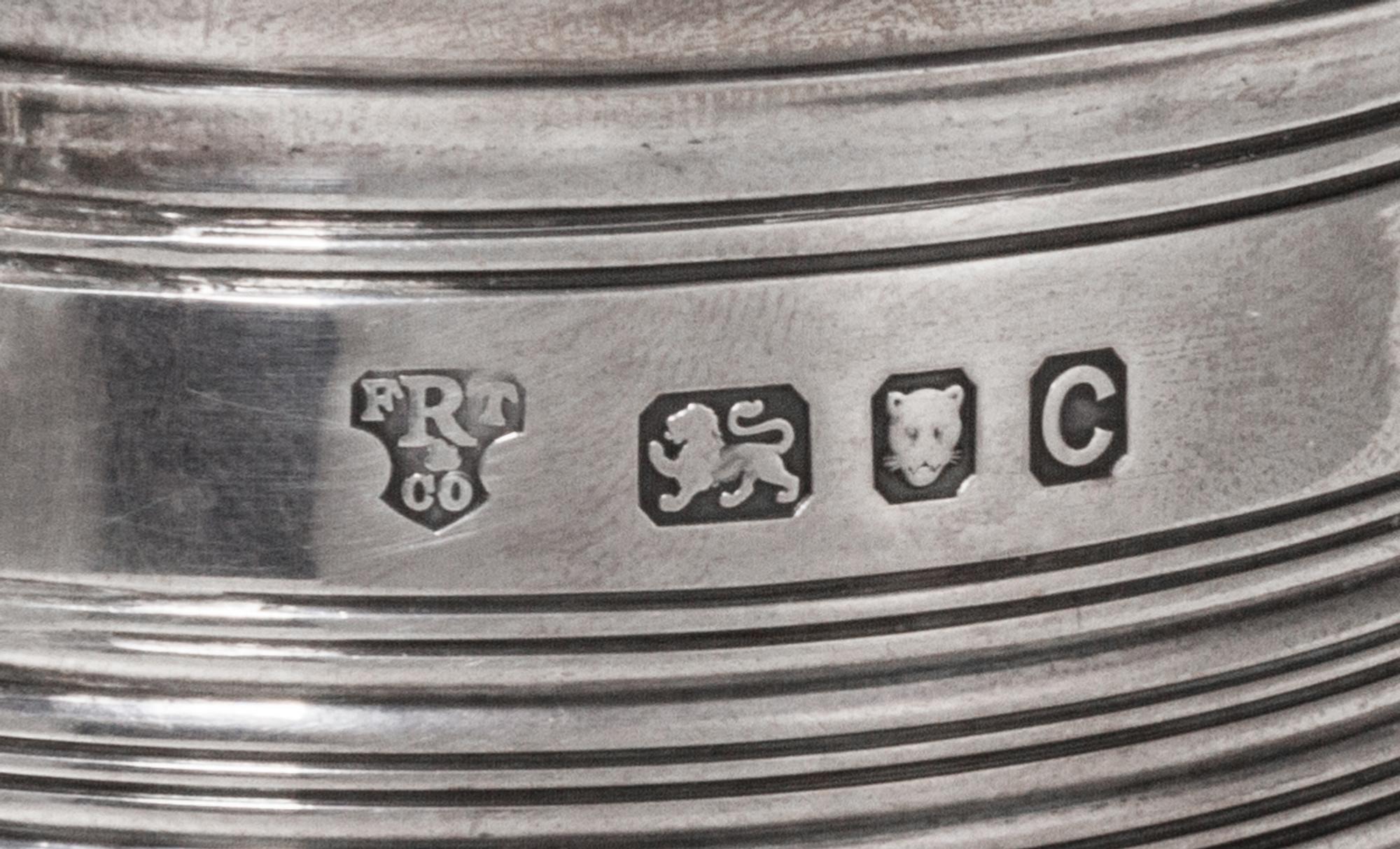 A George VI Silver Tankard, FRT & Co., London, 1938, of tapering form with ringed decoration.