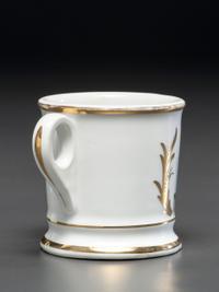 An Automobile Mechanic's Porcelain Occupational Shaving Mug