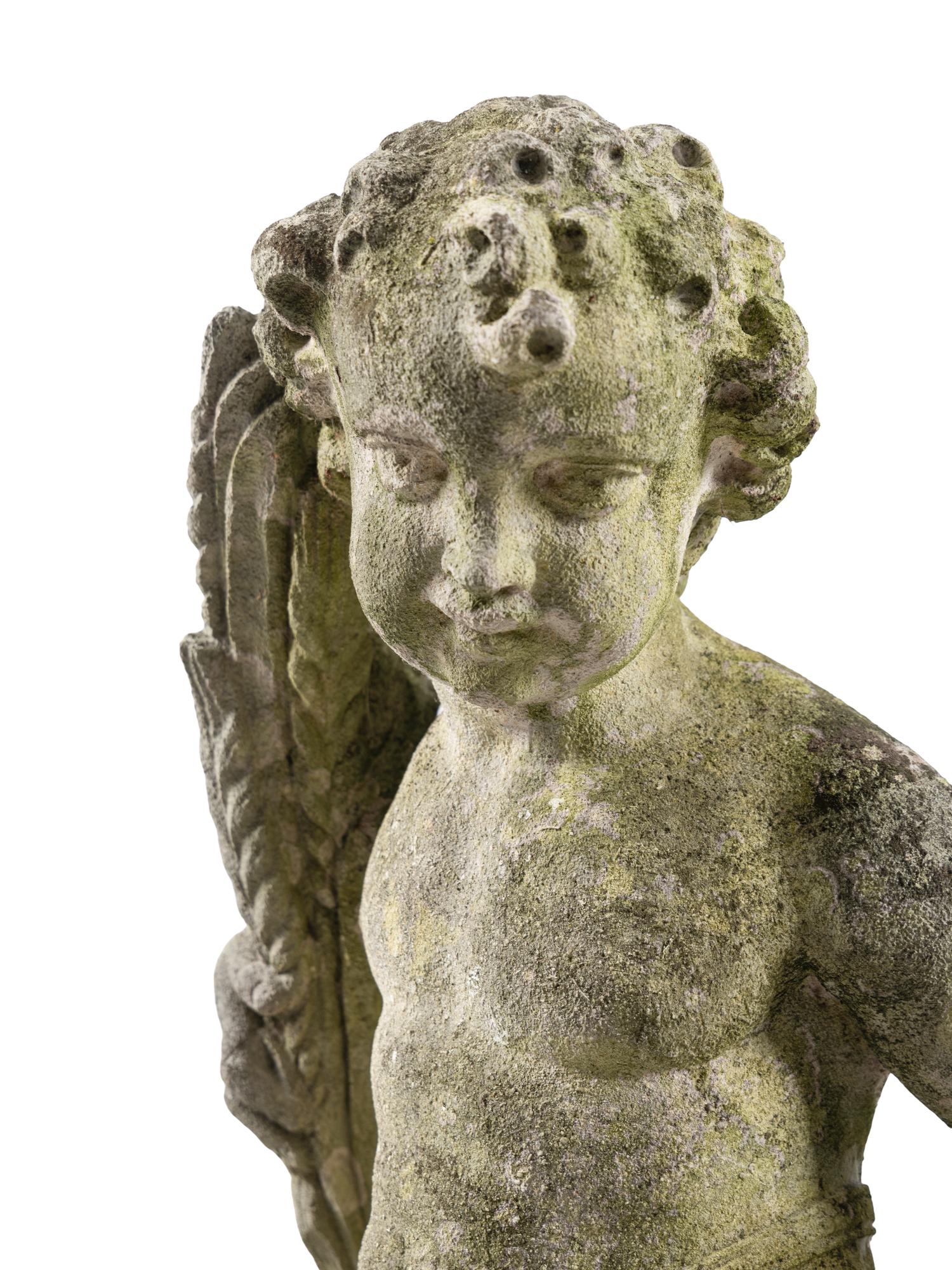 A Pair of Carved Limestone Garden Figures