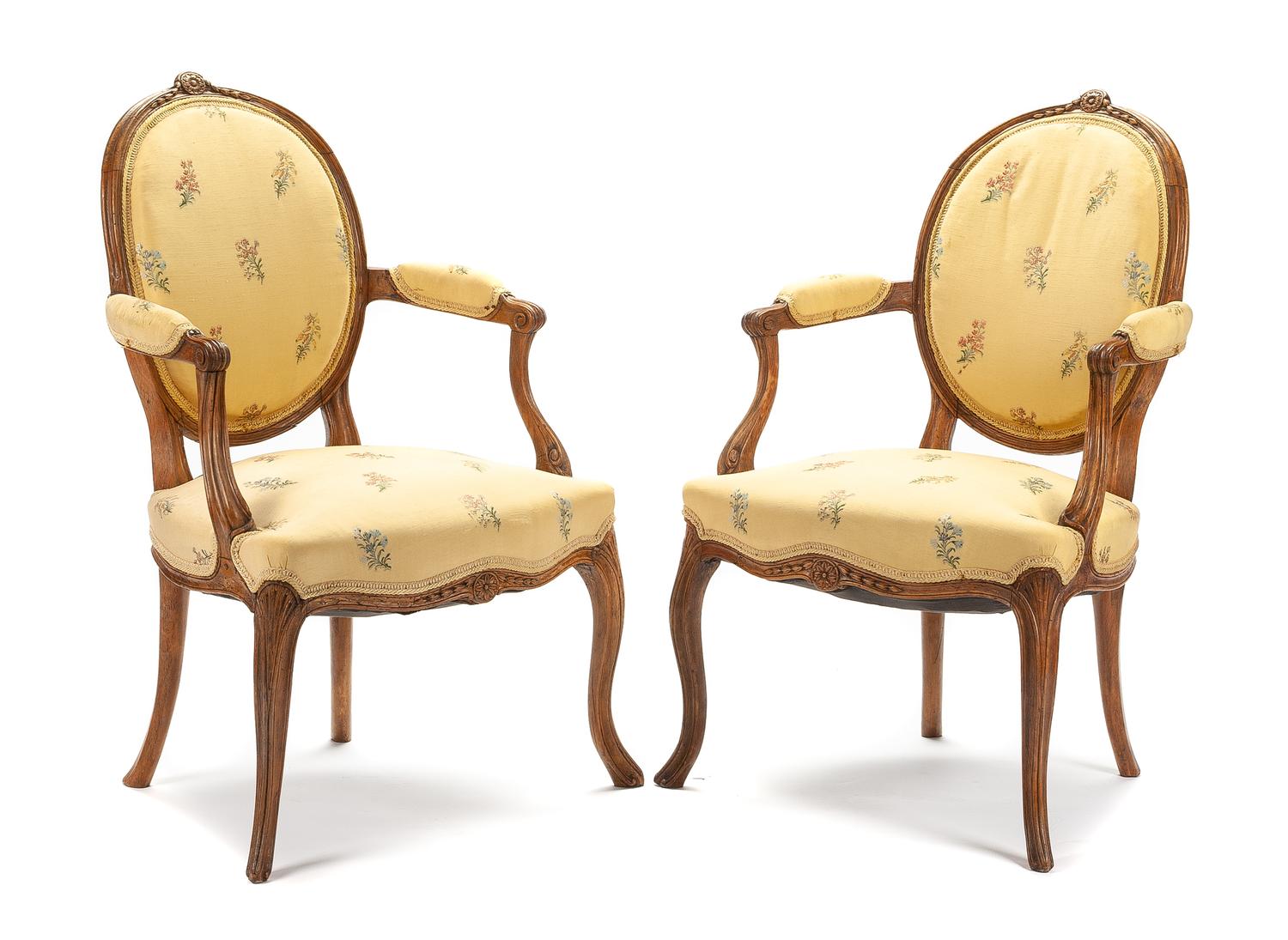 A Pair of George III Walnut Armchairs Height 35 inches. — LATE 18TH CENTURY