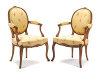 A Pair of George III Walnut Armchairs Height 35 inches. — LATE 18TH CENTURY