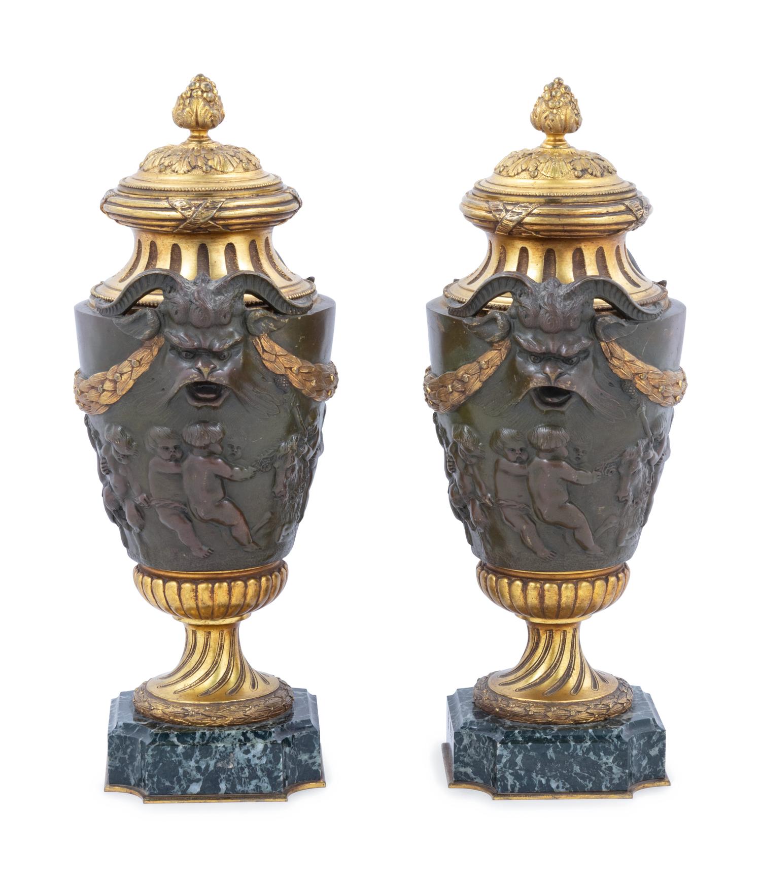A Pair of Neoclassical Gilt and Patinated Bronze Urns