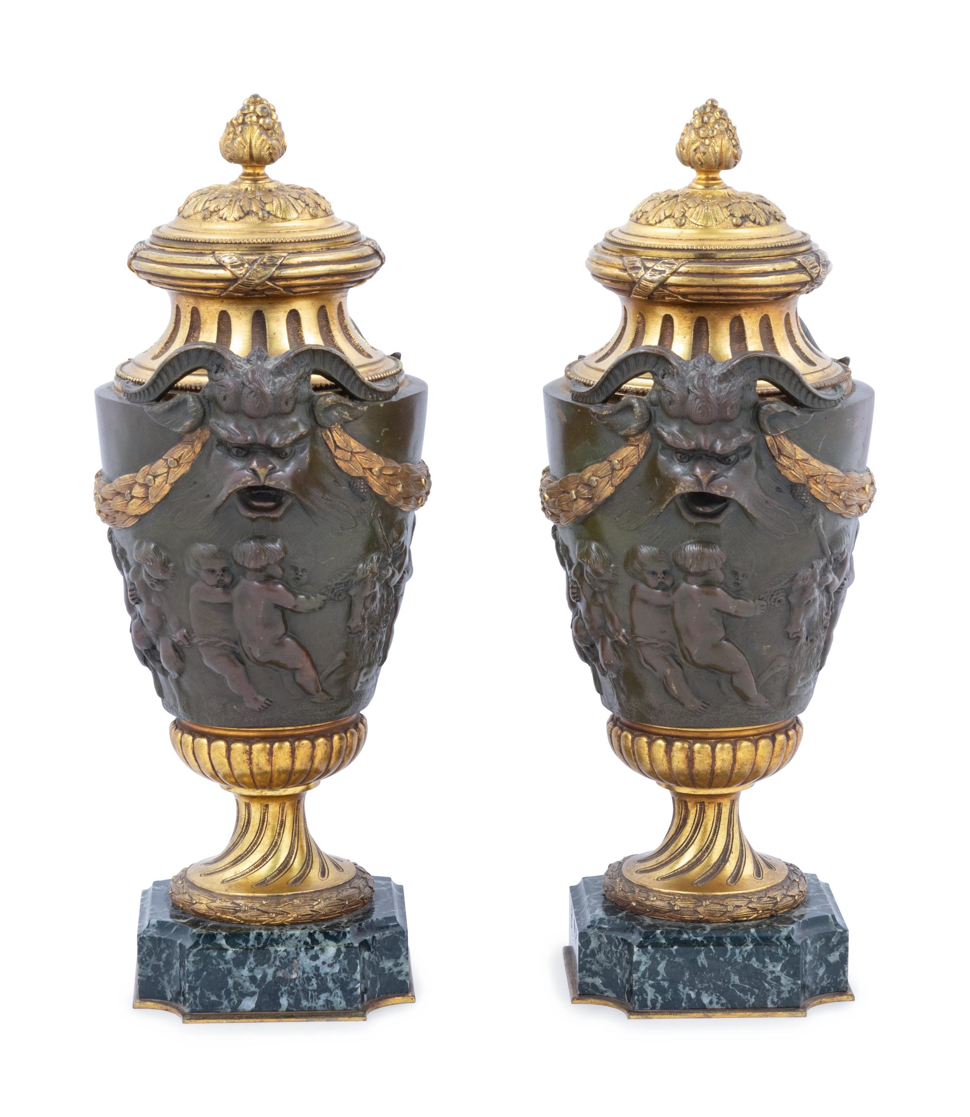 A Pair of Neoclassical Gilt and Patinated Bronze Urns