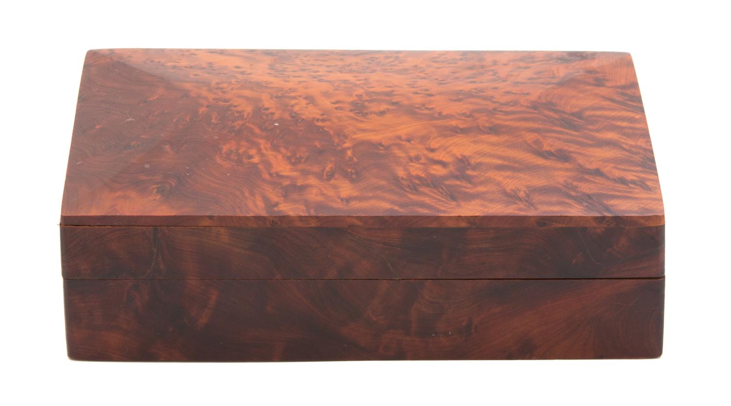 A Burlwood Covered Box Height 2 1/4 x width 7 3/4 x depth 5 inches. — 20TH CENTURY