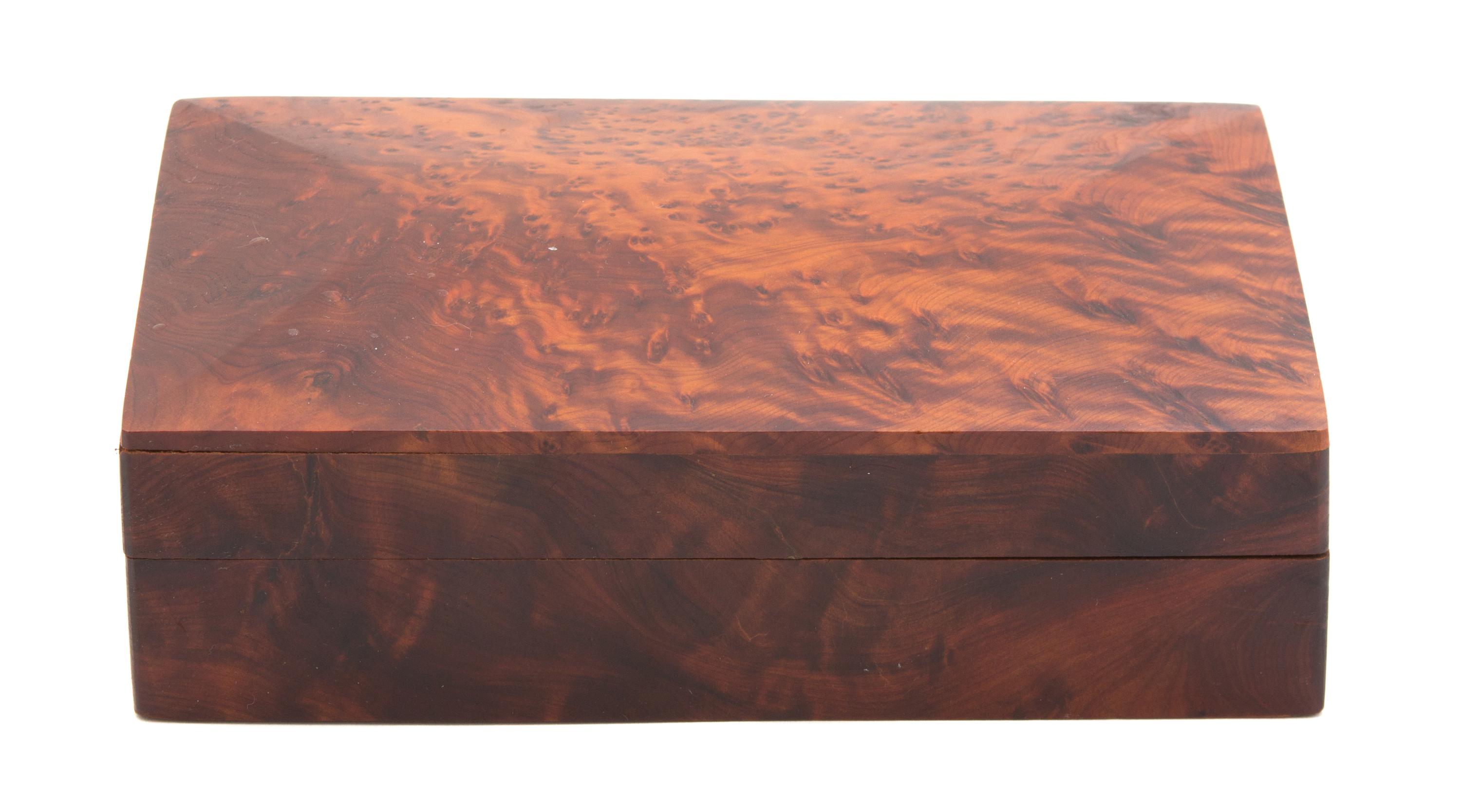 A Burlwood Covered Box Height 2 1/4 x width 7 3/4 x depth 5 inches. — 20TH CENTURY
