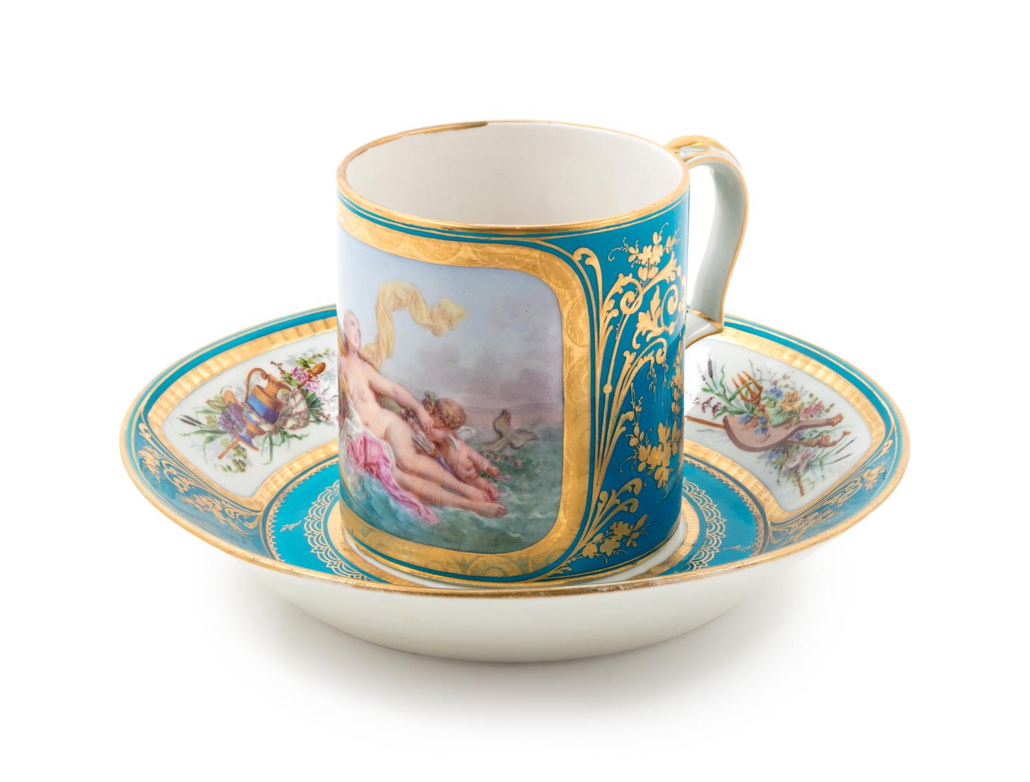 A Sèvres Painted, Parcel Gilt and Celeste Blue-Ground Porcelain Cup and Saucer