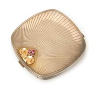 A Sterling Silver, 14 Karat Yellow Gold and Ruby Compact, 78.90 dwts.