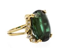 An 18 Karat Yellow Gold, Green Tourmaline and Diamond Ring, 7.30 dwts.