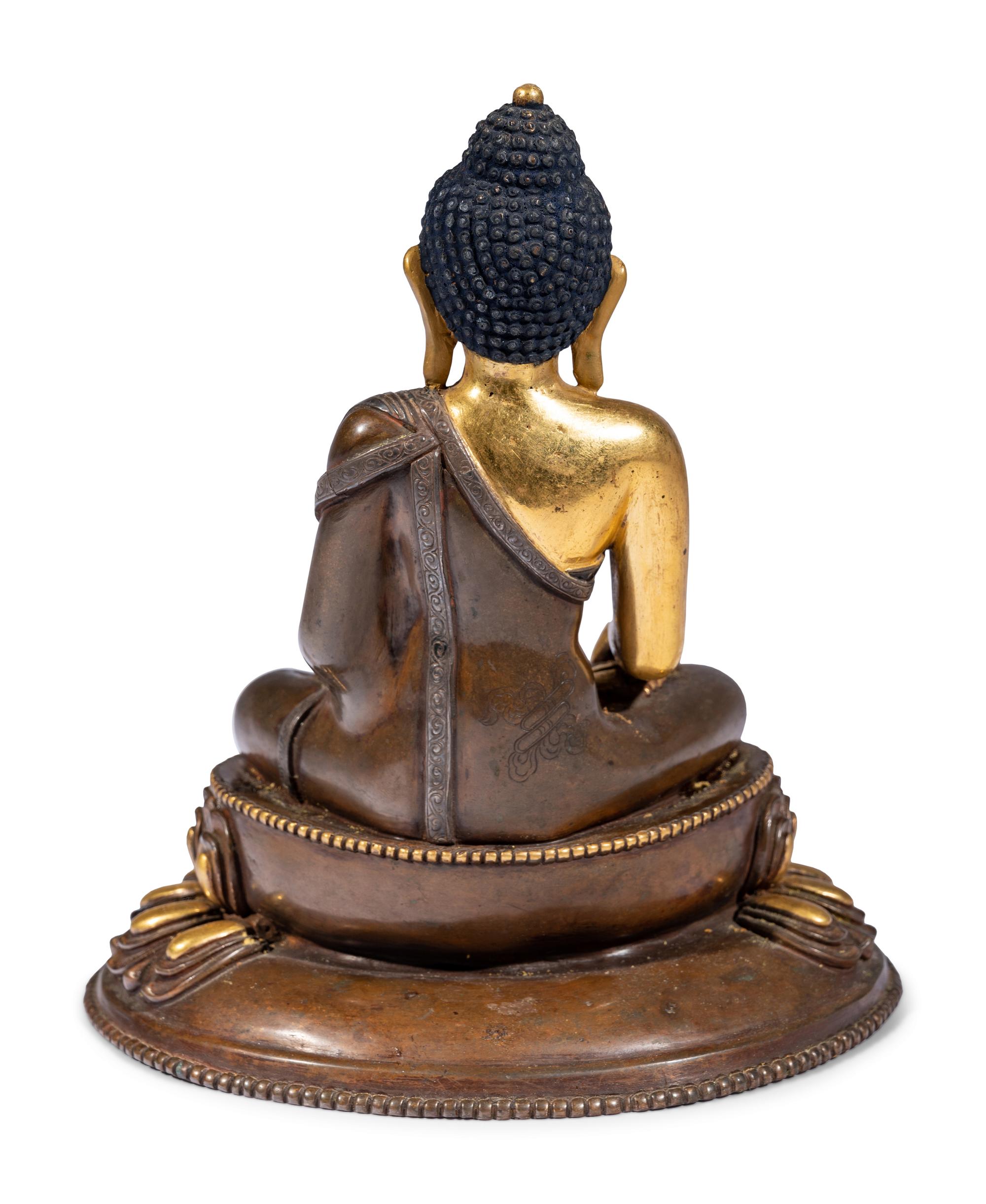 A Sino-Tibetan Gilt Bronze Figure of Buddha