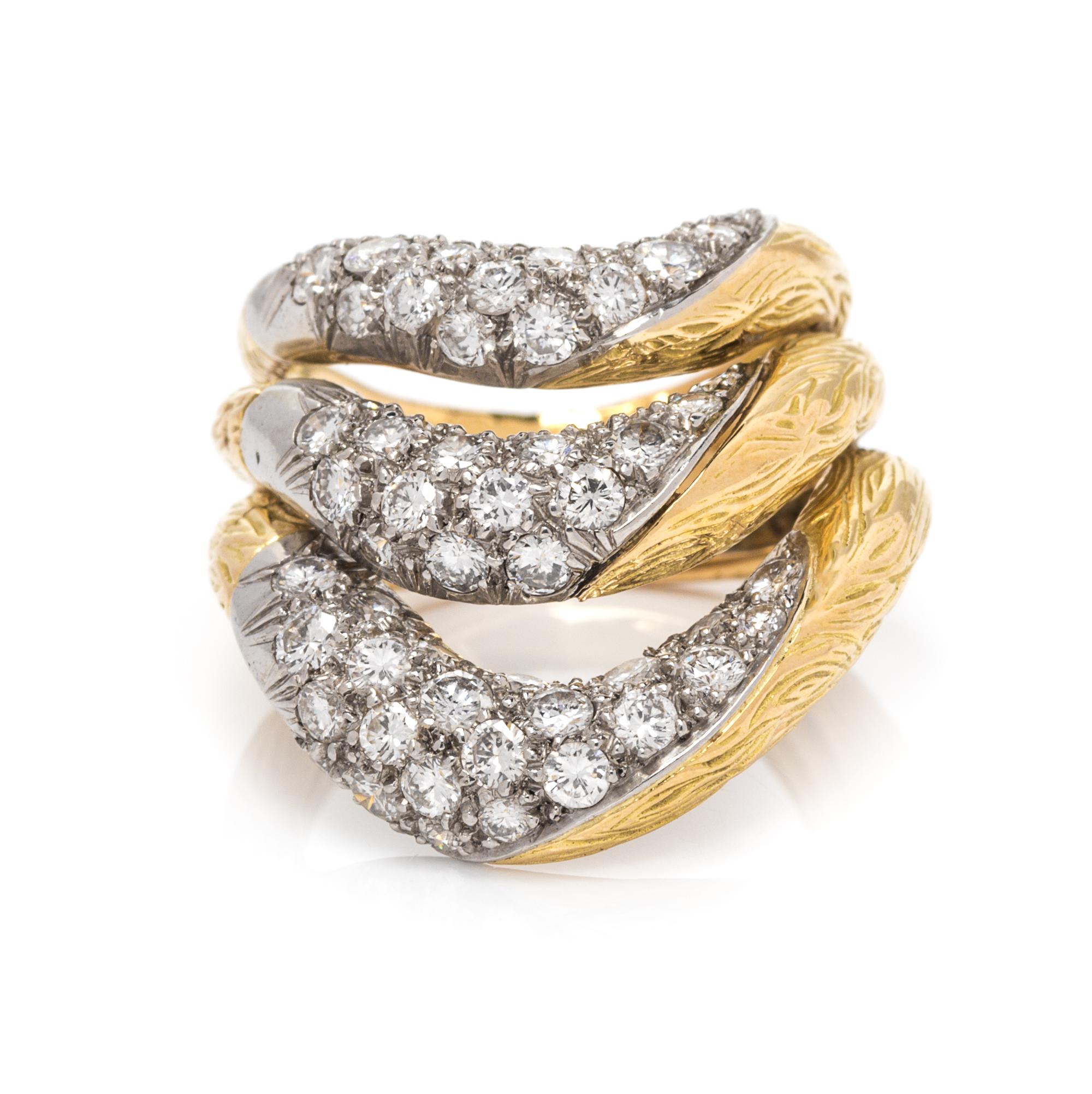 An 18 Karat Yellow Gold, Platinum and Diamond Triple Band, French, 7.65 dwts.
