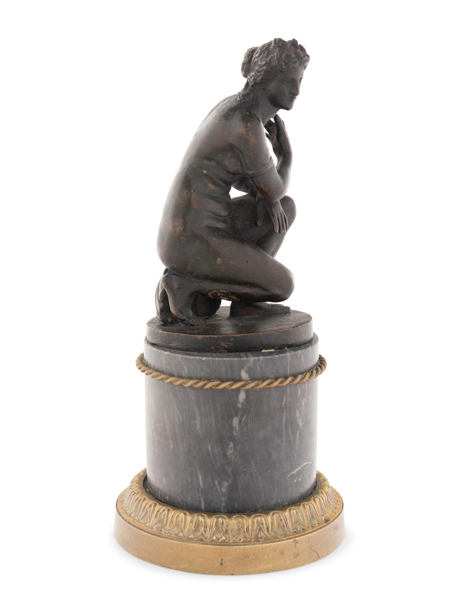 A Continental Bronze Figure of Venus on a Marble Base