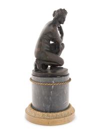 A Continental Bronze Figure of Venus on a Marble Base